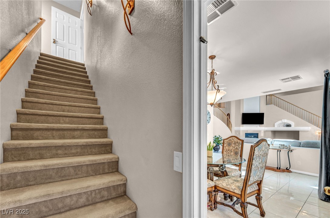 8929 Glenistar Gate Avenue Las Vegas, NV 89143 - Photo 36 of 96 Private Staircase to the upstairs Primary Suite