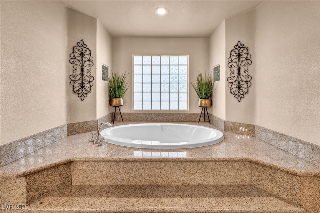 8929 Glenistar Gate Avenue Las Vegas, NV 89143 - Photo 42 of 96 Step into this huge Roman tub!