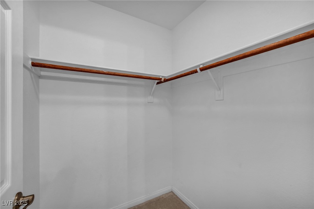 8929 Glenistar Gate Avenue Las Vegas, NV 89143 - Photo 61 of 96 Secondary bedroom walk-in closet