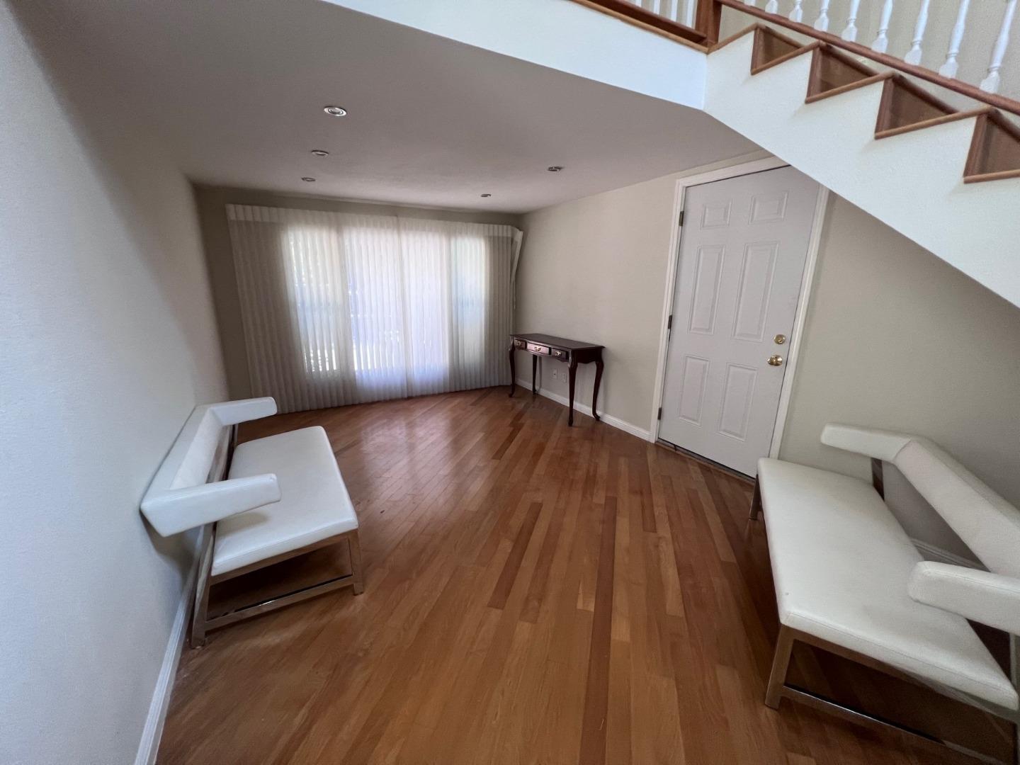 14004 Clayton Road San Jose, CA 95127 - Photo 18 of 43 a living room with furniture and a wooden floor