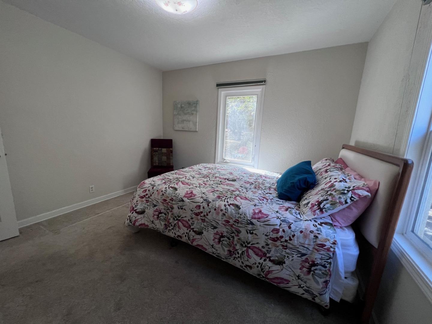 14004 Clayton Road San Jose, CA 95127 - Photo 23 of 43 a bedroom with a bed and a window