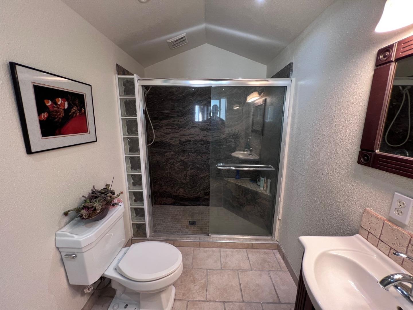 14004 Clayton Road San Jose, CA 95127 - Photo 25 of 43 a bathroom with a toilet and a shower