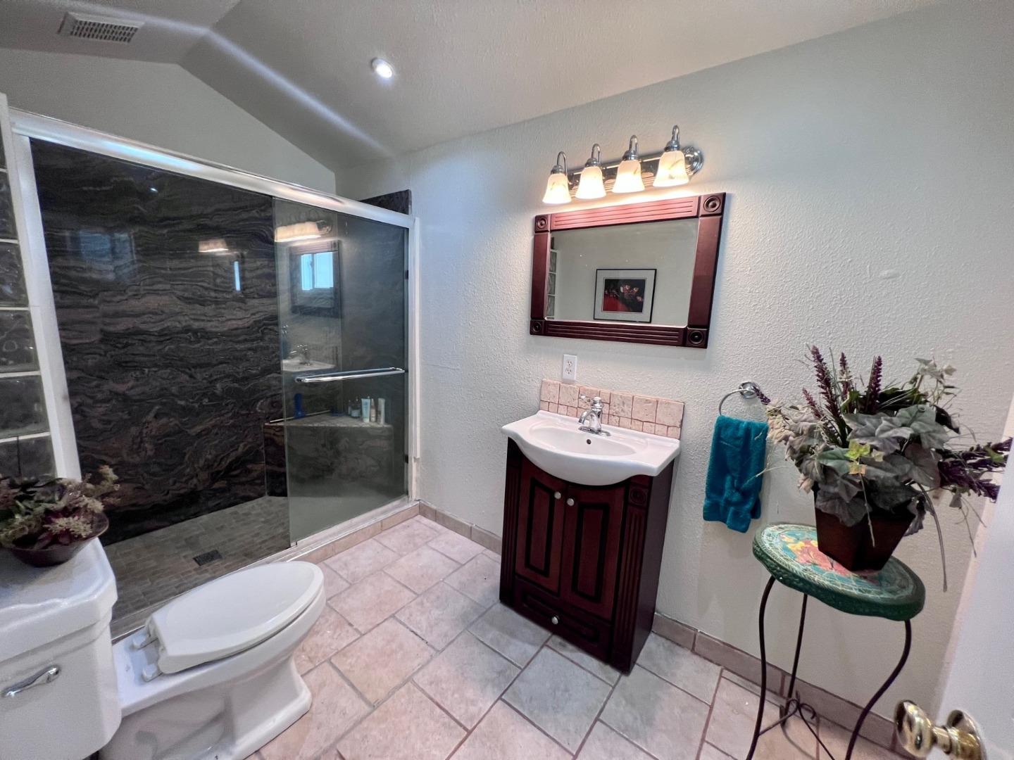 14004 Clayton Road San Jose, CA 95127 - Photo 26 of 43 a bathroom with a sink toilet and shower