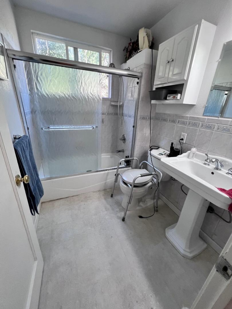 14004 Clayton Road San Jose, CA 95127 - Photo 29 of 43 a bathroom with a sink and mirror