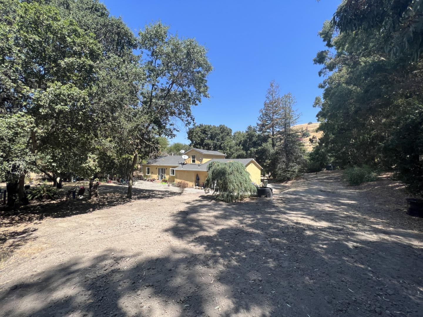 14004 Clayton Road San Jose, CA 95127 - Photo 38 of 43 a view of a dirt road with a building in the background