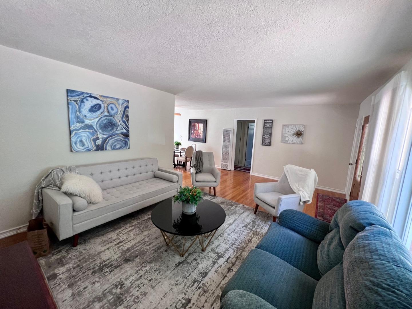 14004 Clayton Road San Jose, CA 95127 - Photo 7 of 43 a living room with furniture a rug and a window