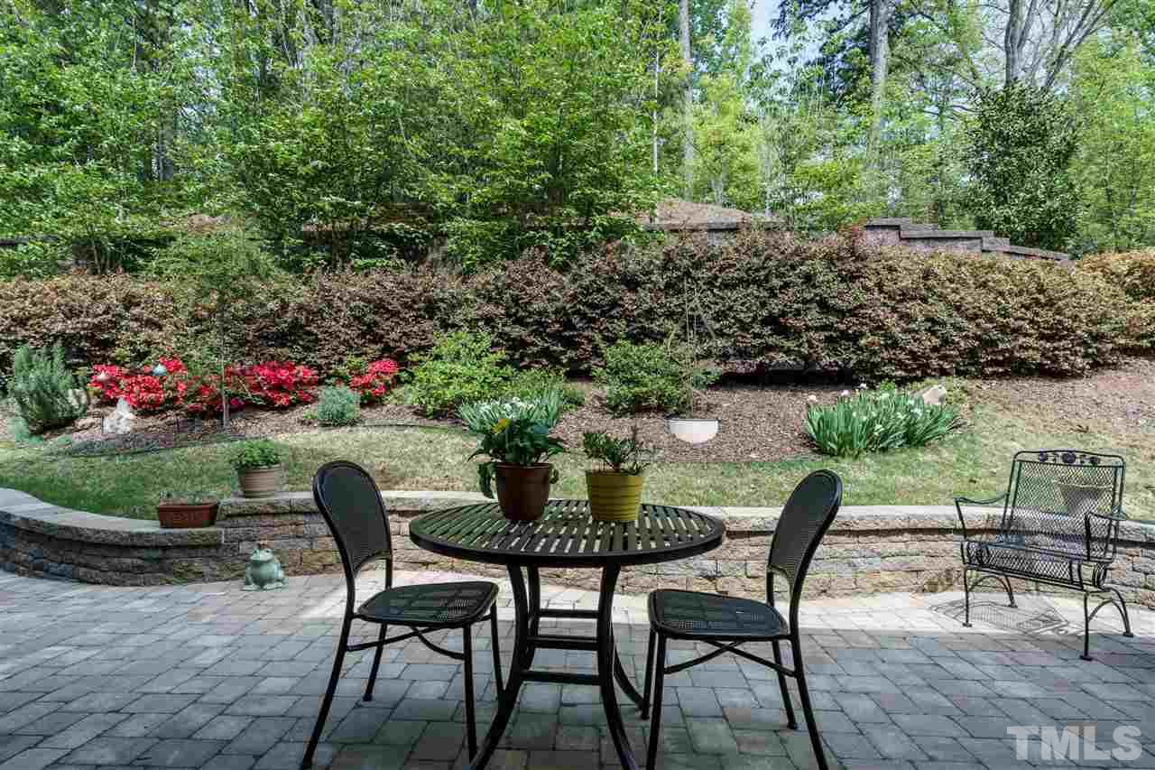 4005 Periwinkle Blue Lane Raleigh, NC 27612 - Photo 26 of 29 ...has beautiful plantings above the masonry wall...