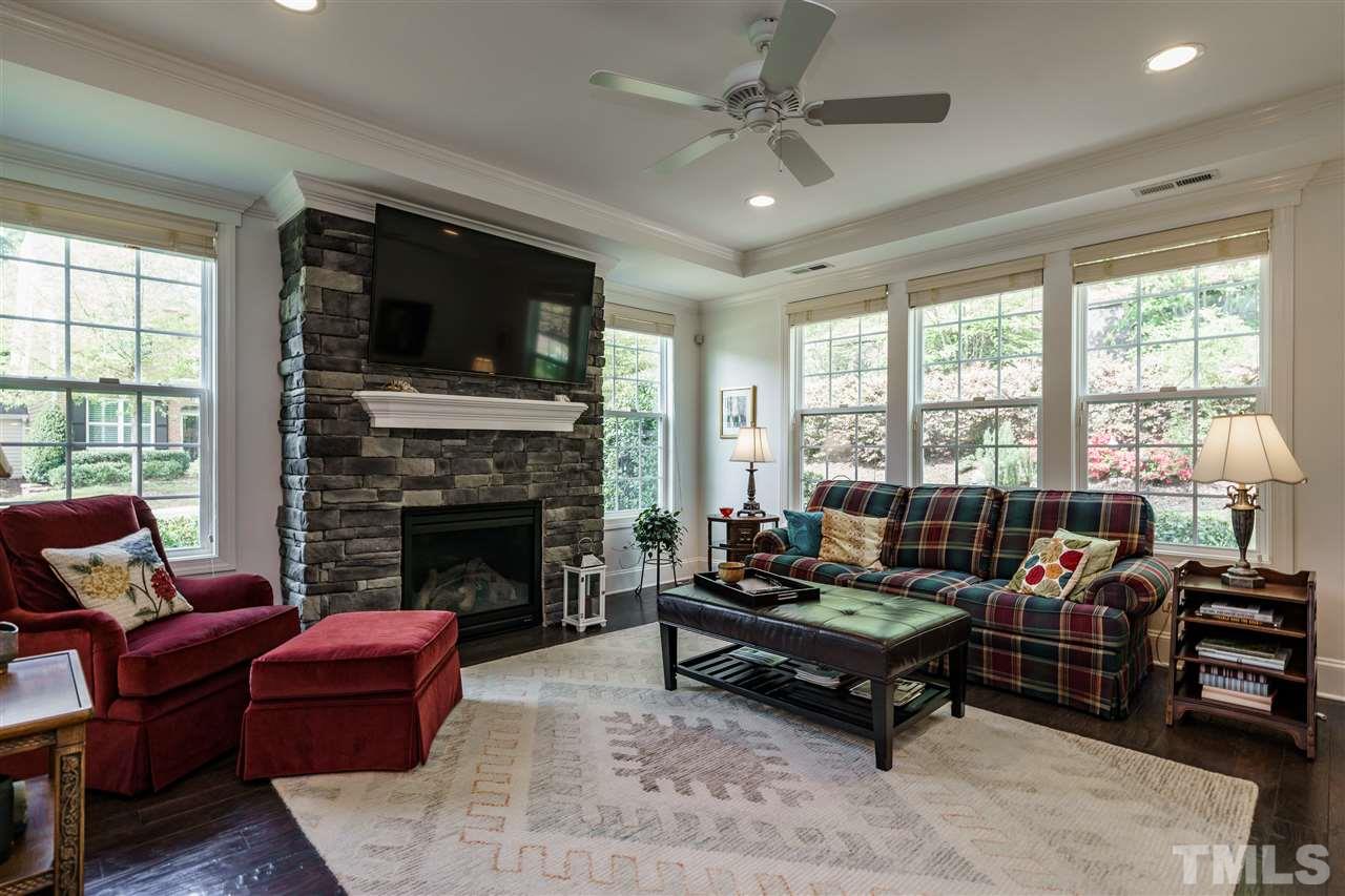 4005 Periwinkle Blue Lane Raleigh, NC 27612 - Photo 5 of 29 ...has lots of windows, stone fireplace with gas logs
