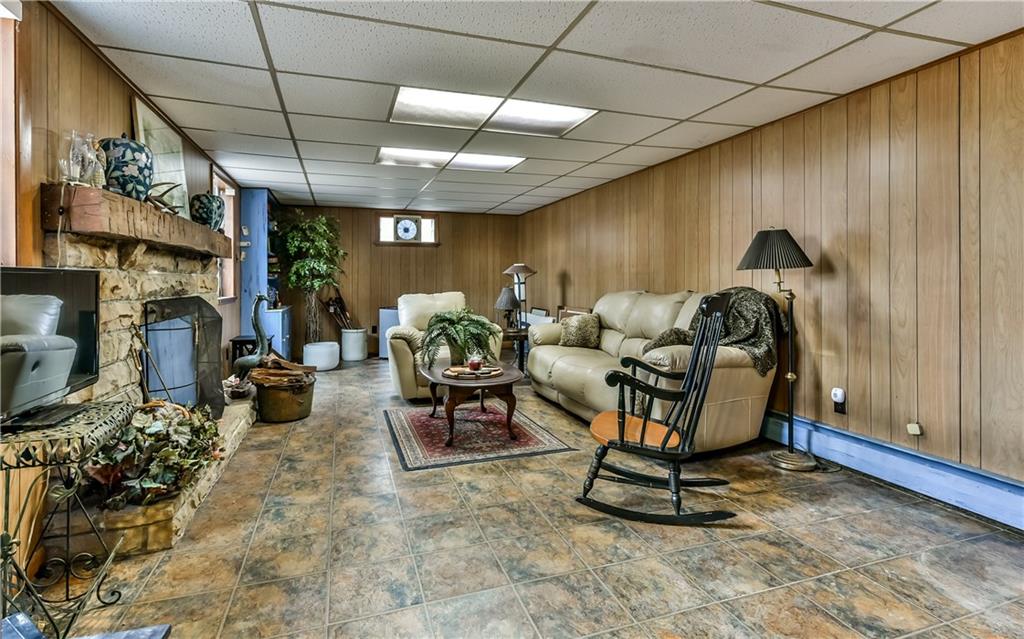 3923 Gibsonia Road Gibsonia, PA 15044 - Photo 21 of 25 Huge finished game room on the lower level with a working wood-burning stone fireplace!