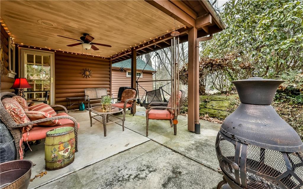 3923 Gibsonia Road Gibsonia, PA 15044 - Photo 23 of 25 Fabulous, private covered patio with ceiling light and fan. Looks out to the level wooded 2 acre lot! Perfect for warm summer nights!