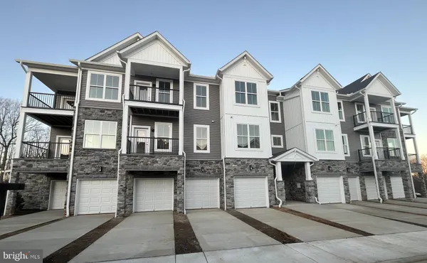 a front view of residential houses