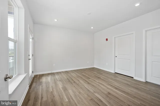 a bathroom with a double vanity sink mirror and shower