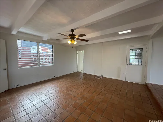 a view of an empty room and window