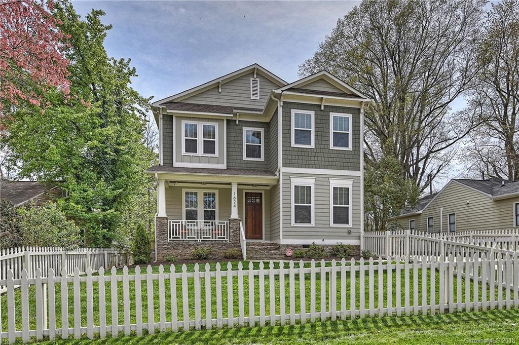 1624 Brook Road Charlotte, NC 28205 - Photo 2 of 34 a front view of a house with a garden