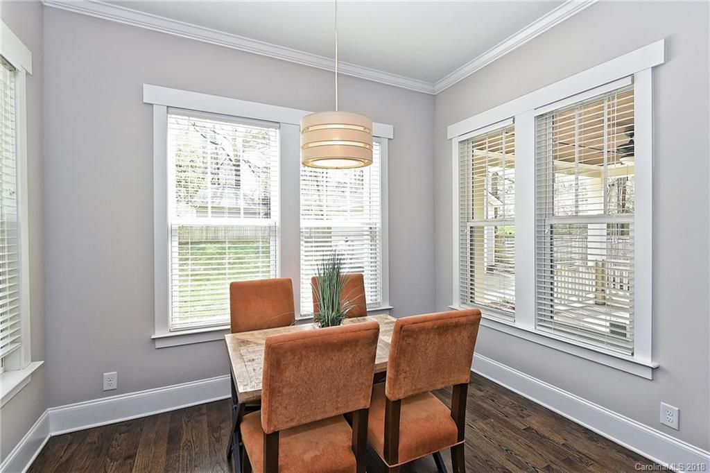 1624 Brook Road Charlotte, NC 28205 - Photo 14 of 34 a dining room with furniture and windows