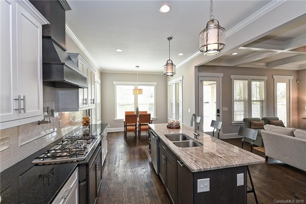 1624 Brook Road Charlotte, NC 28205 - Photo 18 of 34 a large kitchen with lots of counter space and stainless steel appliances