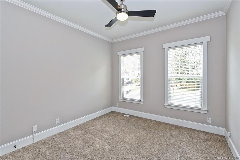 1624 Brook Road Charlotte, NC 28205 - Photo 19 of 34 a view of an empty room with a window