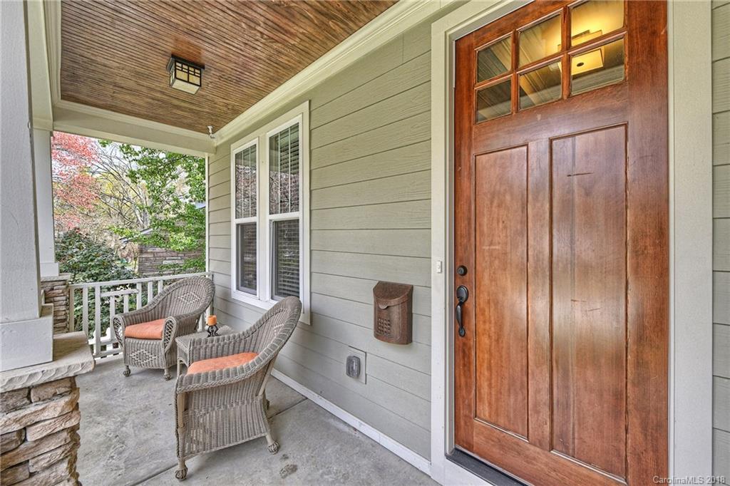1624 Brook Road Charlotte, NC 28205 - Photo 3 of 34 a view of a door with a chairs and table in a patio