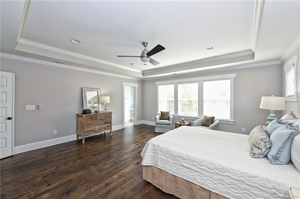 1624 Brook Road Charlotte, NC 28205 - Photo 22 of 34 a bedroom with a bed and window