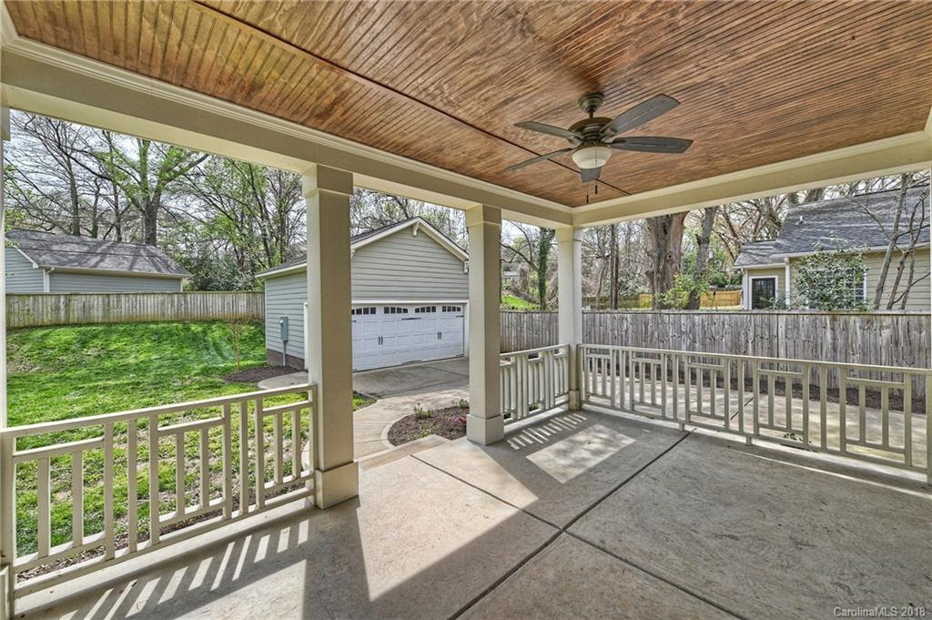 1624 Brook Road Charlotte, NC 28205 - Photo 30 of 34 a view of a porch with wooden floor and fence