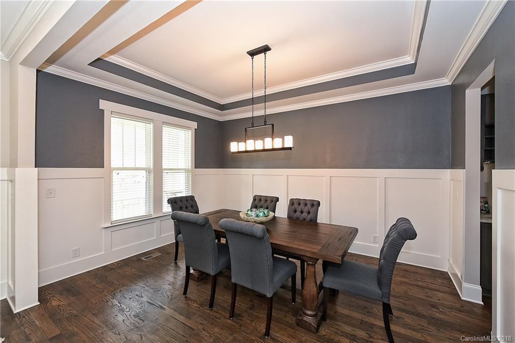 1624 Brook Road Charlotte, NC 28205 - Photo 6 of 34 a view of a dining room with furniture window and wooden floor