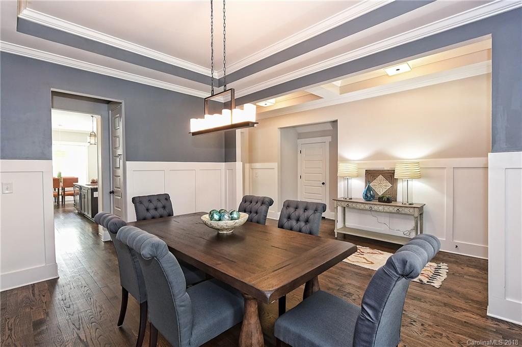 1624 Brook Road Charlotte, NC 28205 - Photo 7 of 34 a view of a dining room with furniture and wooden floor