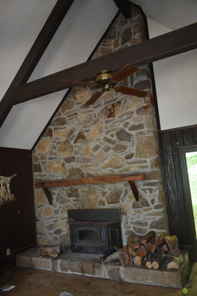 19 Kemp Hollow Road Pleasant Shade, TN 37145 - Photo 2 of 8 a view of fireplace and wooden floor