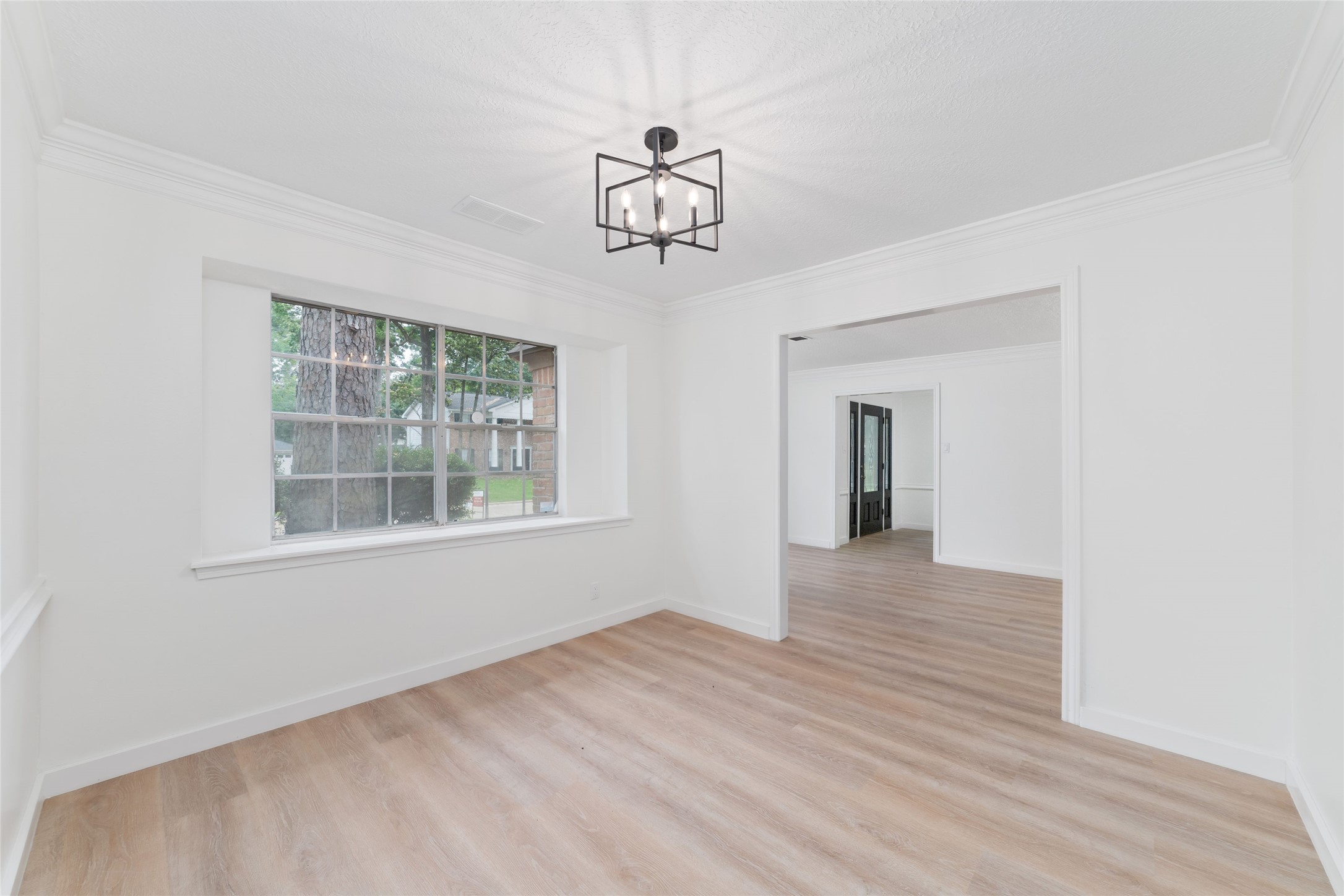 7910 Oak Moss Drive Spring, TX 77379 - Photo 4 of 38 Bright, spacious former dining and sitting areas