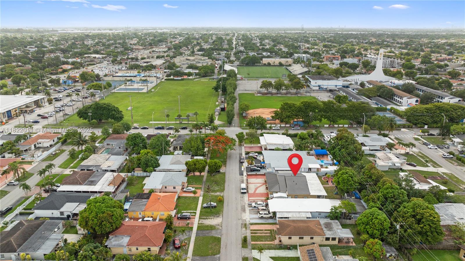 230 West 47th Street Hialeah, FL 33012 - Photo 12 of 58 an aerial view of residential houses with outdoor space