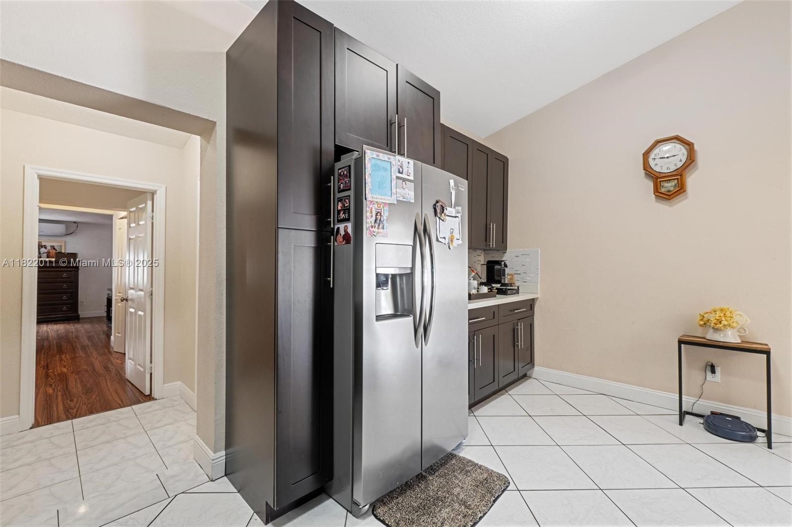 230 West 47th Street Hialeah, FL 33012 - Photo 22 of 58 a kitchen with stainless steel appliances granite countertop a refrigerator and a sink