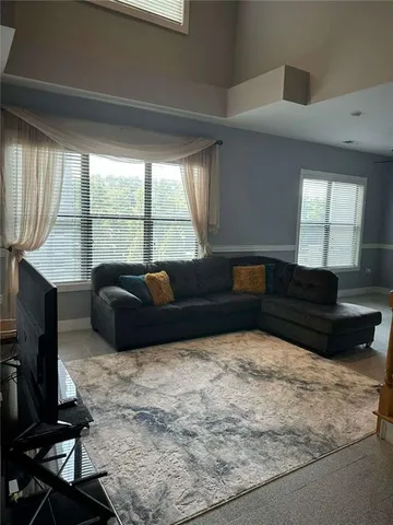 a large bathroom with a sink and a mirror