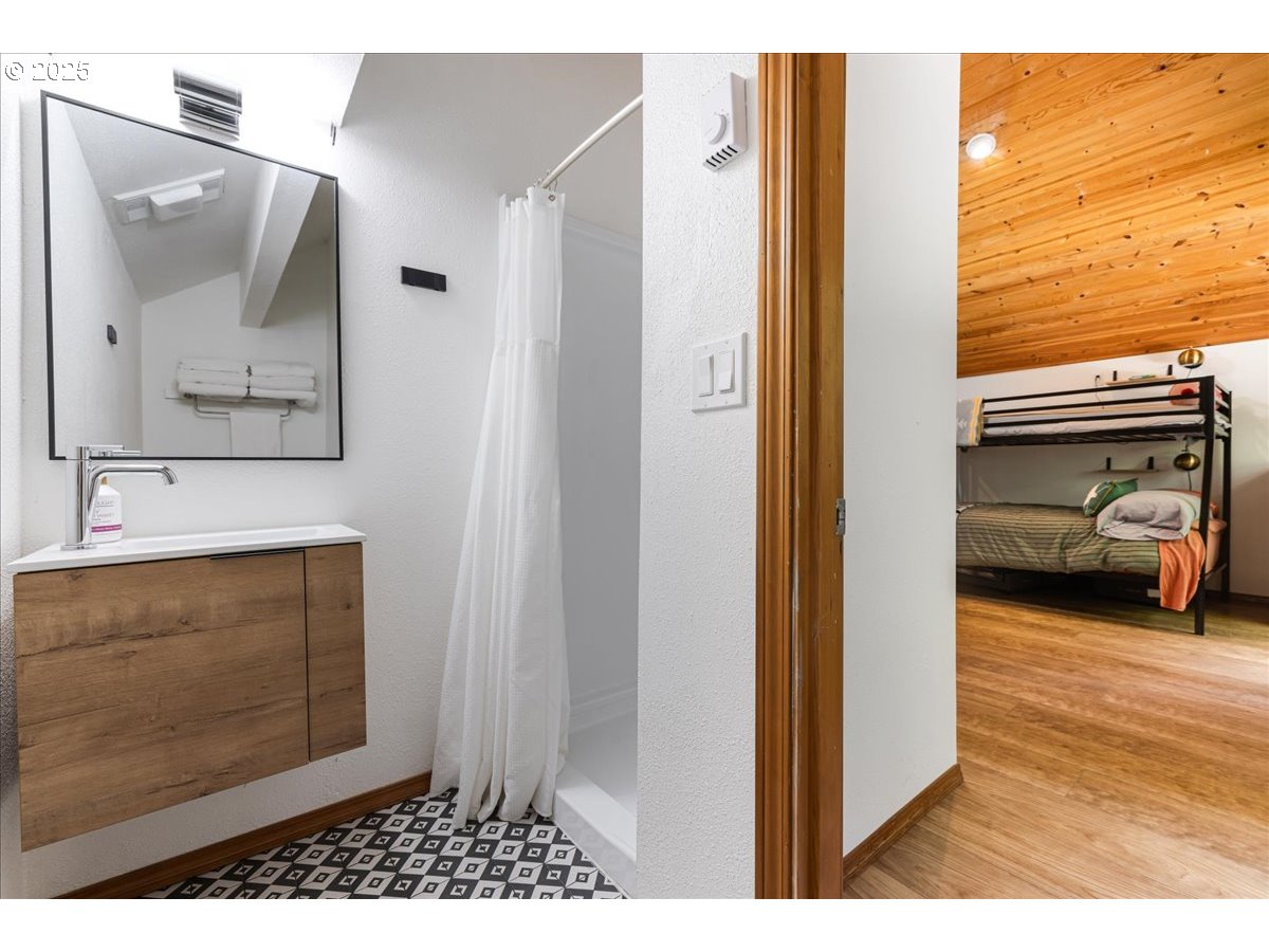 1717 Kalama River Road Kalama, WA 98625 - Photo 19 of 48 a view of a bedroom from a hallway