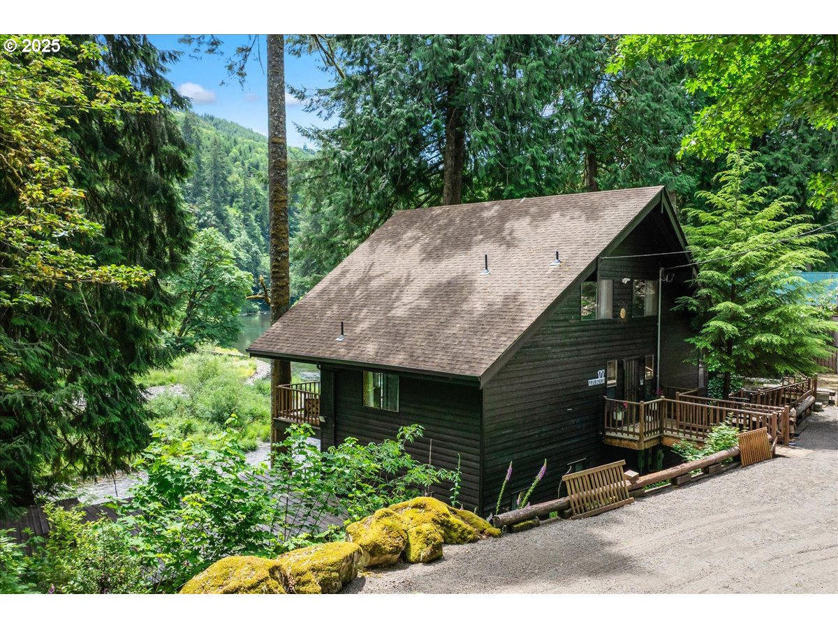 1717 Kalama River Road Kalama, WA 98625 - Photo 2 of 48 a view of a house with a yard and sitting area