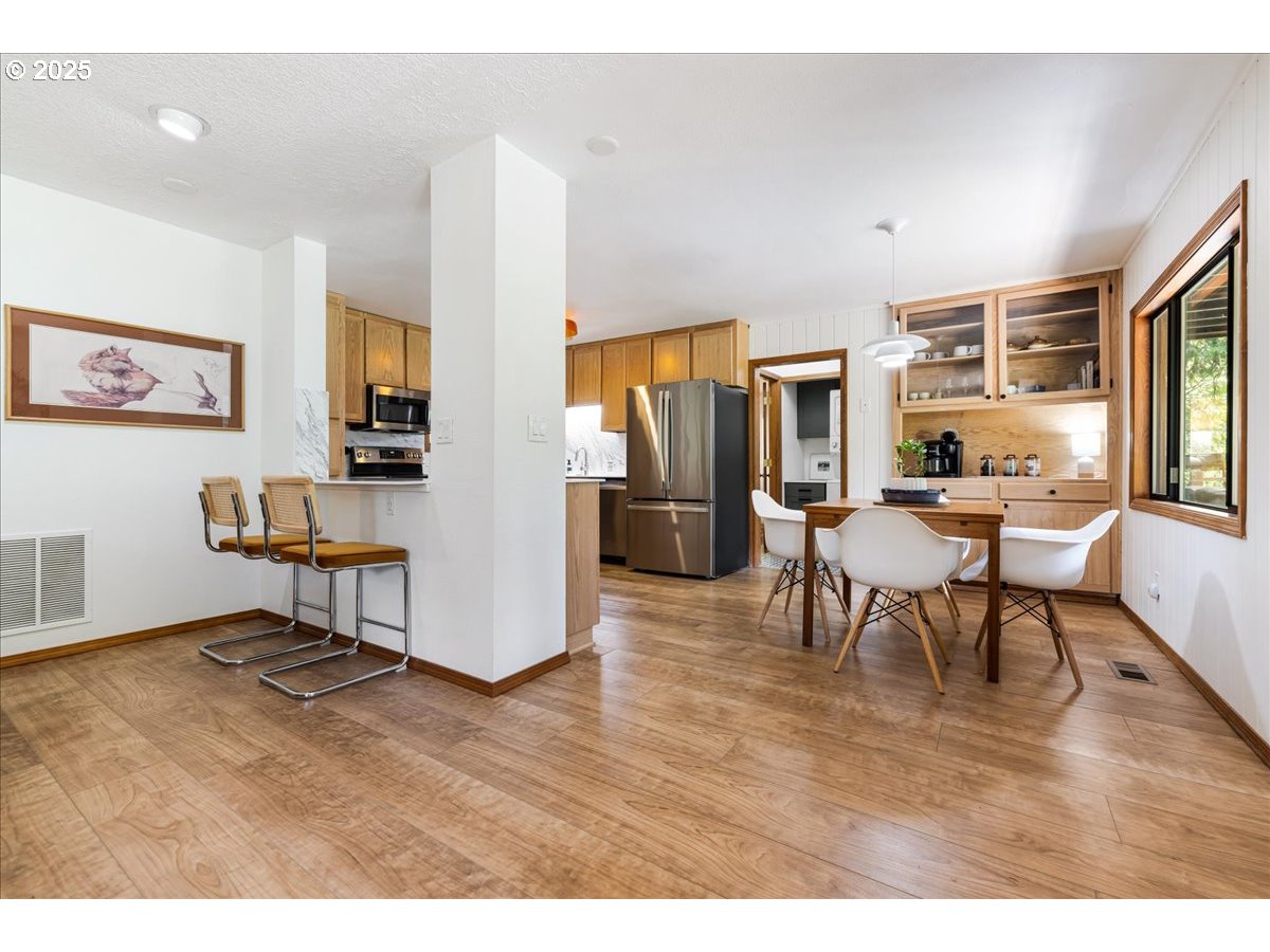 1717 Kalama River Road Kalama, WA 98625 - Photo 23 of 48 a living room with furniture and a table