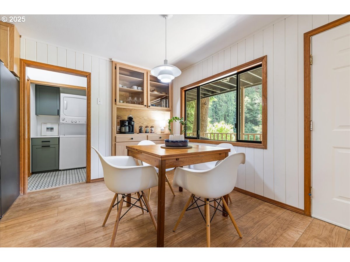 1717 Kalama River Road Kalama, WA 98625 - Photo 24 of 48 a dining room with furniture a chandelier and wooden floor