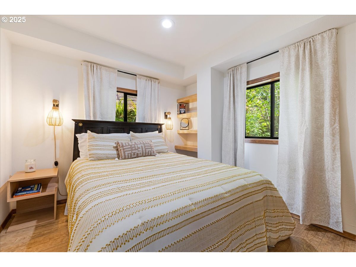 1717 Kalama River Road Kalama, WA 98625 - Photo 25 of 48 a bedroom with a bed and a window