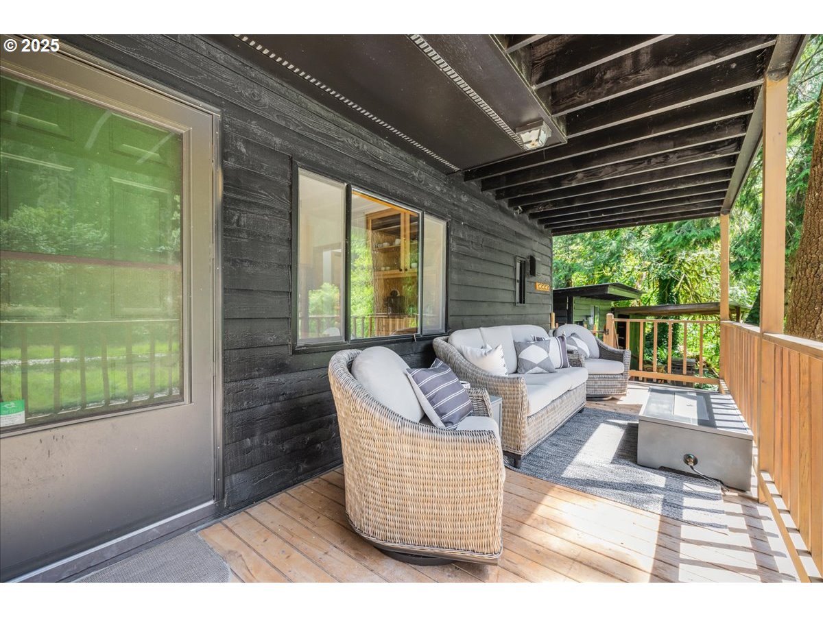 1717 Kalama River Road Kalama, WA 98625 - Photo 31 of 48 a balcony with furniture and a garden