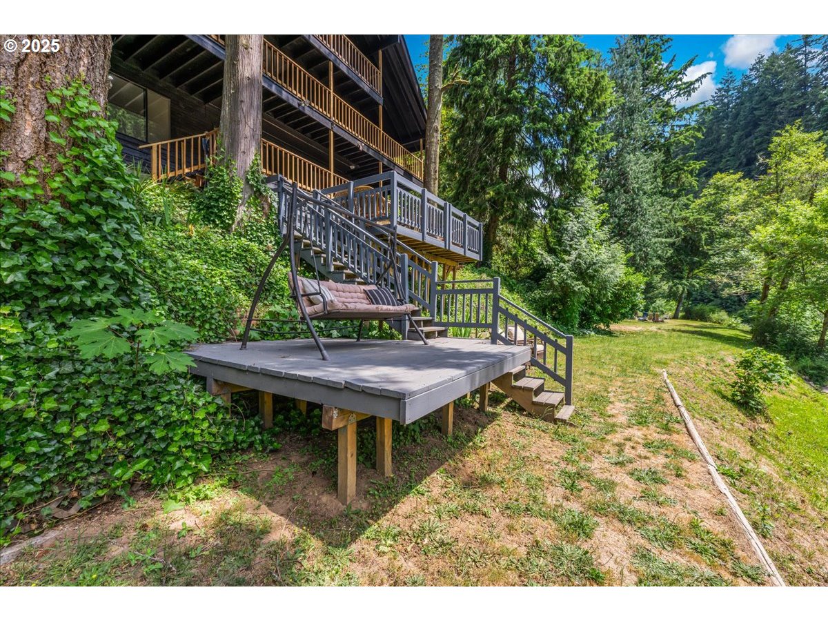 1717 Kalama River Road Kalama, WA 98625 - Photo 39 of 48 a backyard of a house with table and chairs