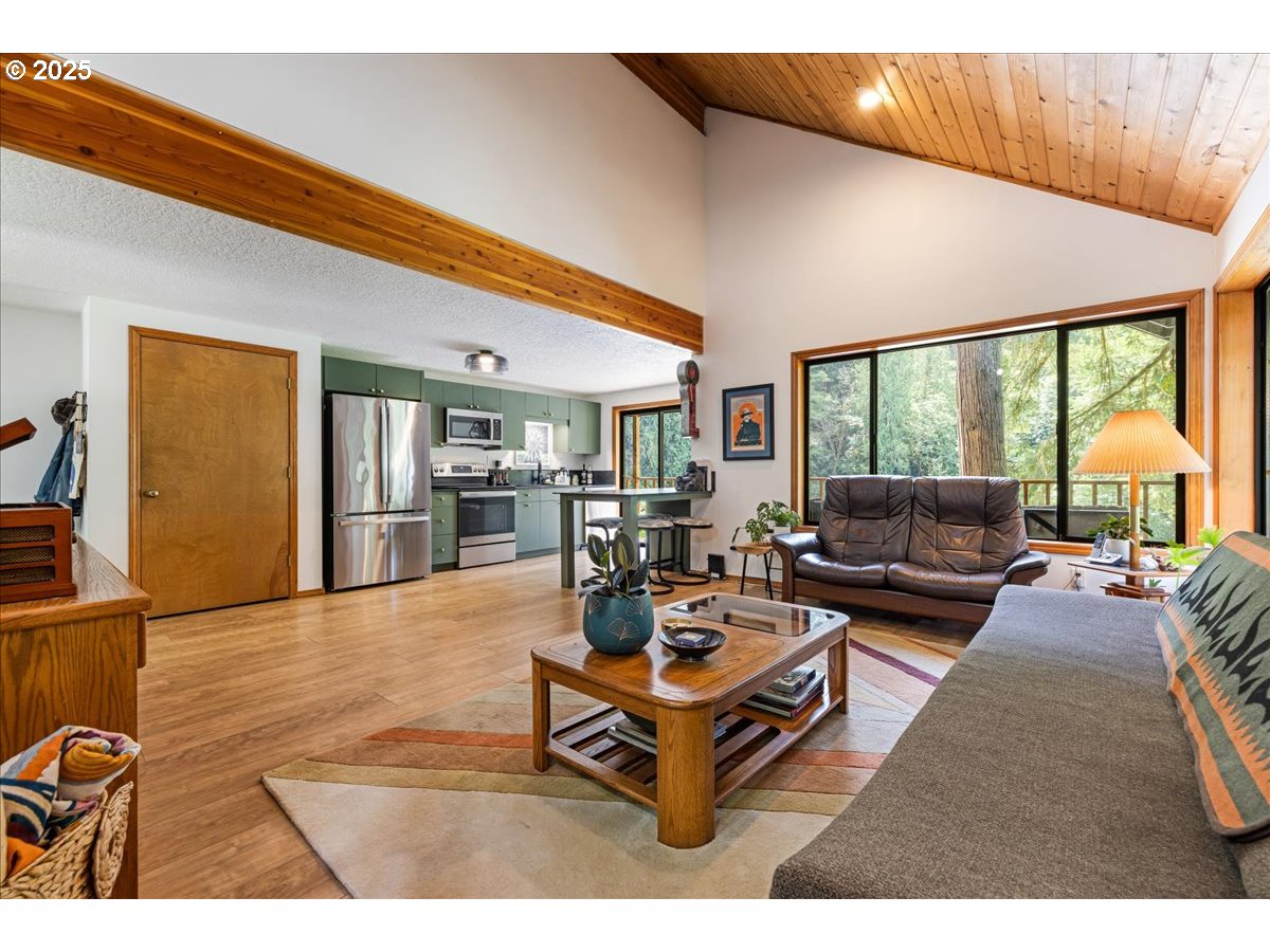 1717 Kalama River Road Kalama, WA 98625 - Photo 4 of 48 a living room with furniture city view and large windows