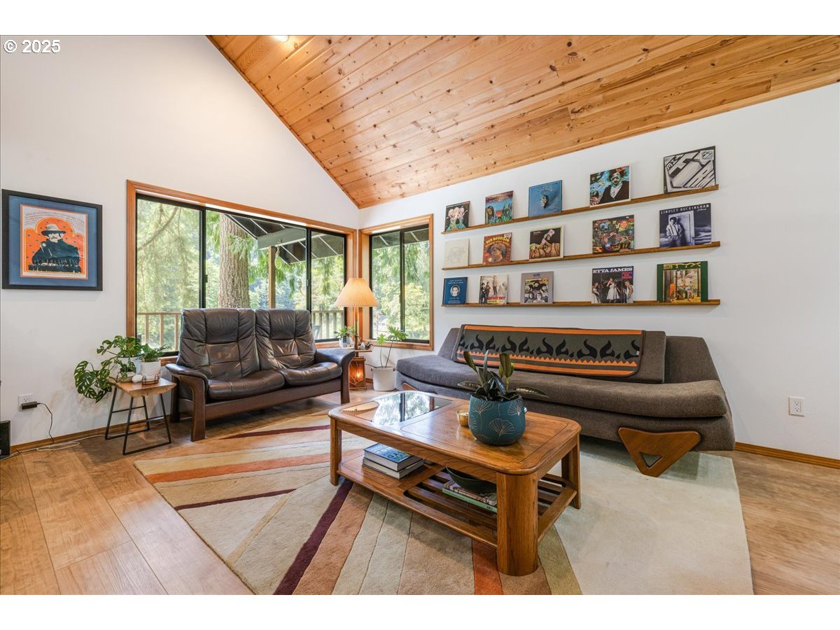 1717 Kalama River Road Kalama, WA 98625 - Photo 8 of 48 a living room with furniture a rug and white walls