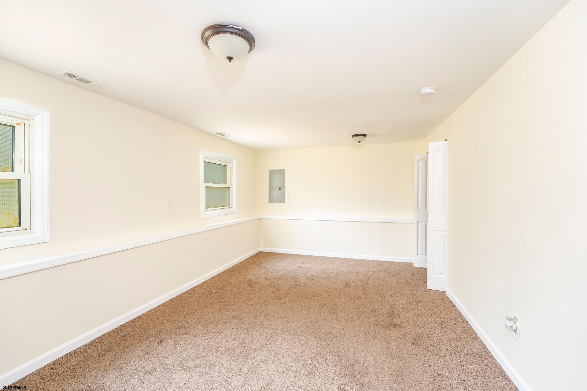 7 Folson Road Millville, NJ 08332 - Photo 15 of 41 a view of a livingroom with an empty space