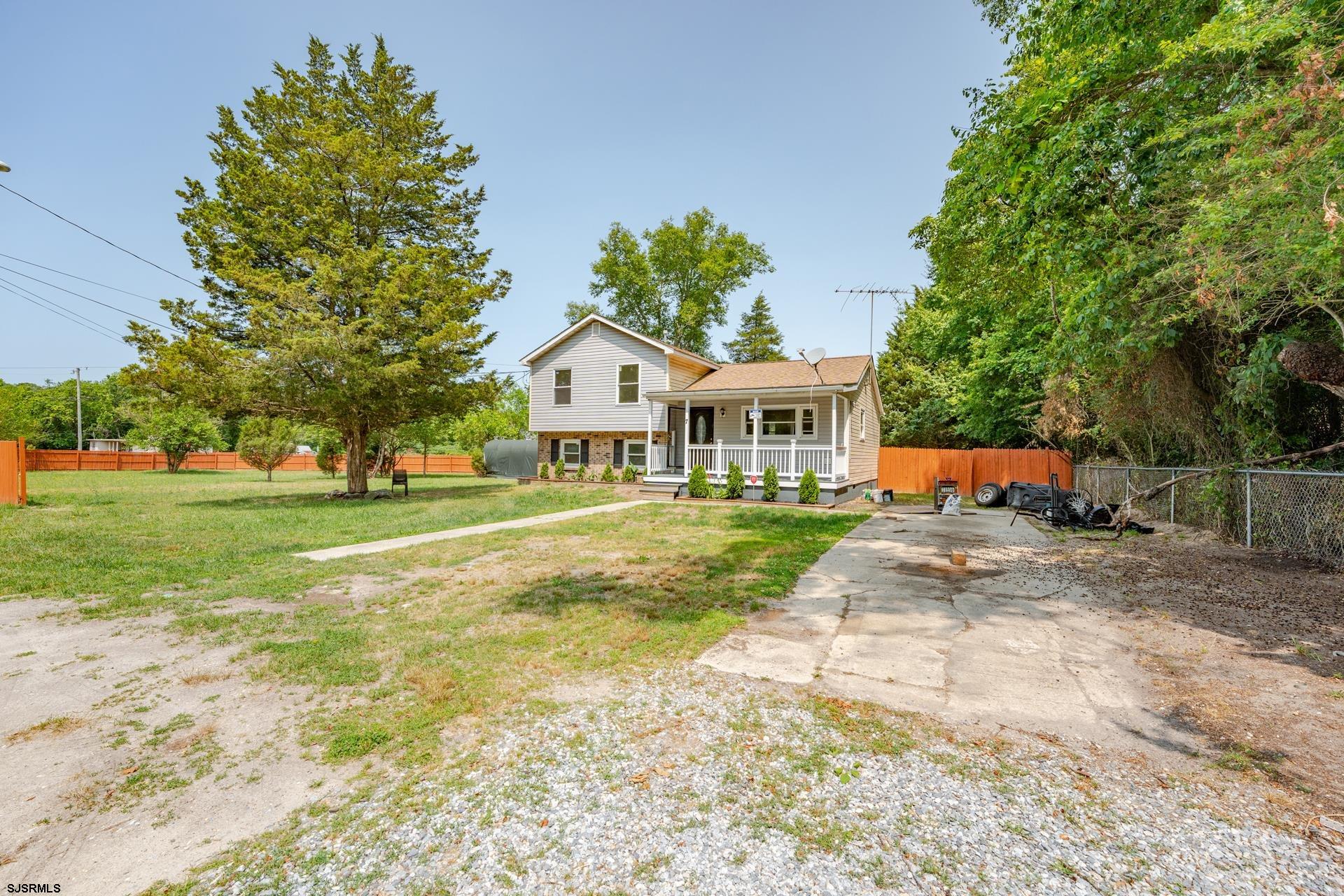 7 Folson Road Millville, NJ 08332 - Photo 2 of 41 a front view of a house with a yard