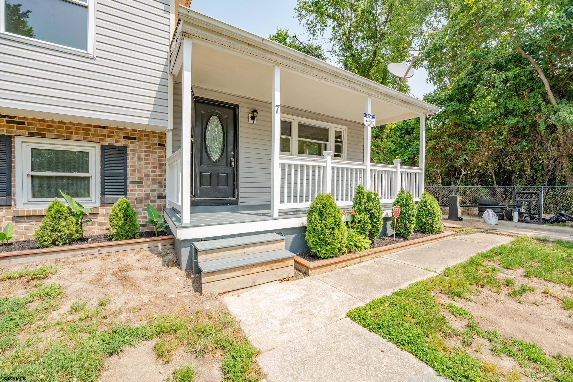 7 Folson Road Millville, NJ 08332 - Photo 5 of 41 a house with a garden in front of it