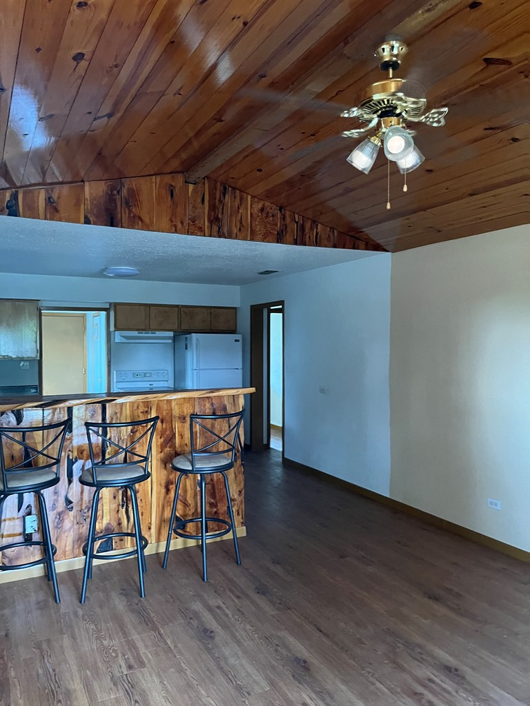 303 B 1st St Center Point Center Point, TX 78010 - Photo 3 of 11 a view of a room with wooden floor