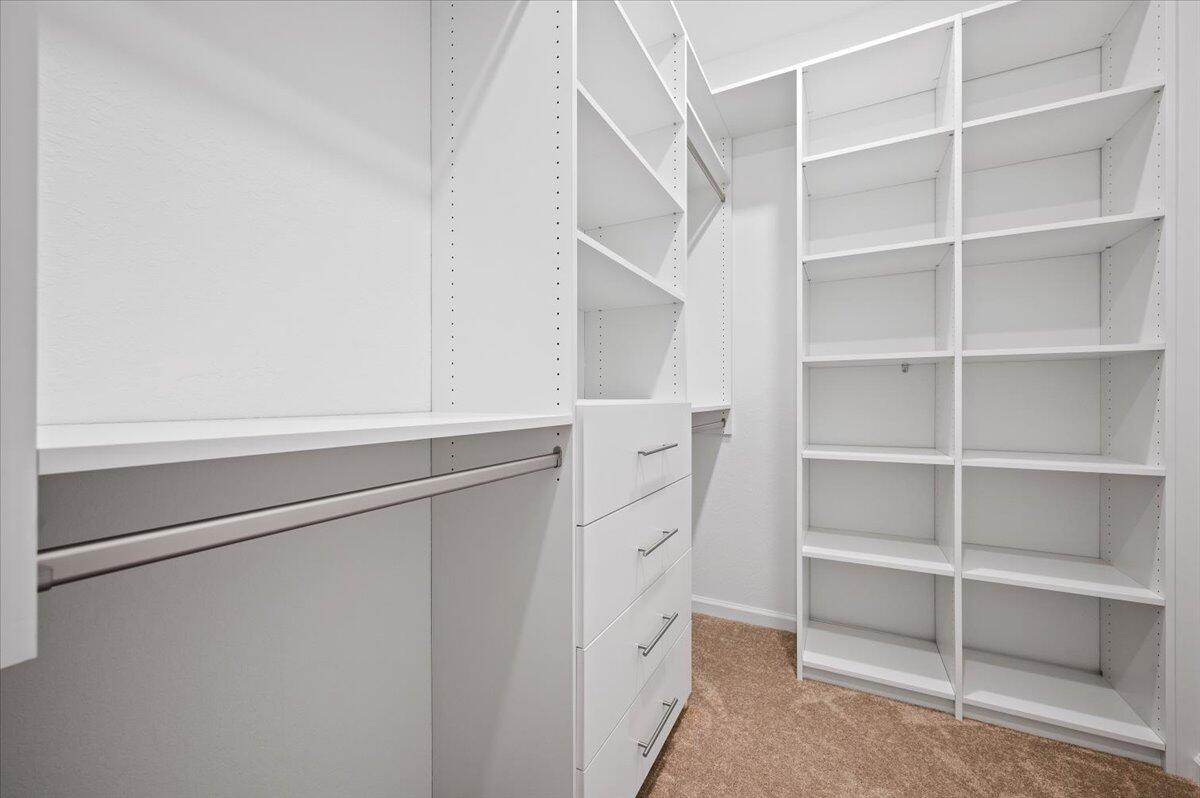 9915 Southwest Meridian Way Stuart, FL 34997 - Photo 16 of 32 Primary Suite Walk-In Closet