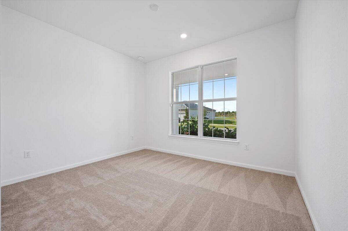 9915 Southwest Meridian Way Stuart, FL 34997 - Photo 17 of 32 Downstairs 4th Bed/Den