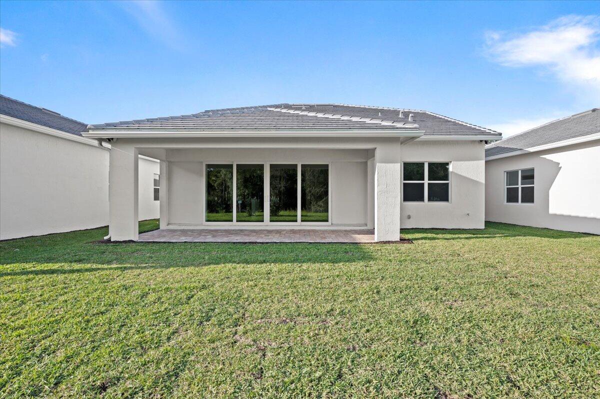 9915 Southwest Meridian Way Stuart, FL 34997 - Photo 2 of 32 Extended Covered Patio