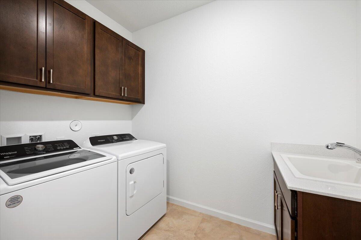 9915 Southwest Meridian Way Stuart, FL 34997 - Photo 29 of 32 Laundry Room