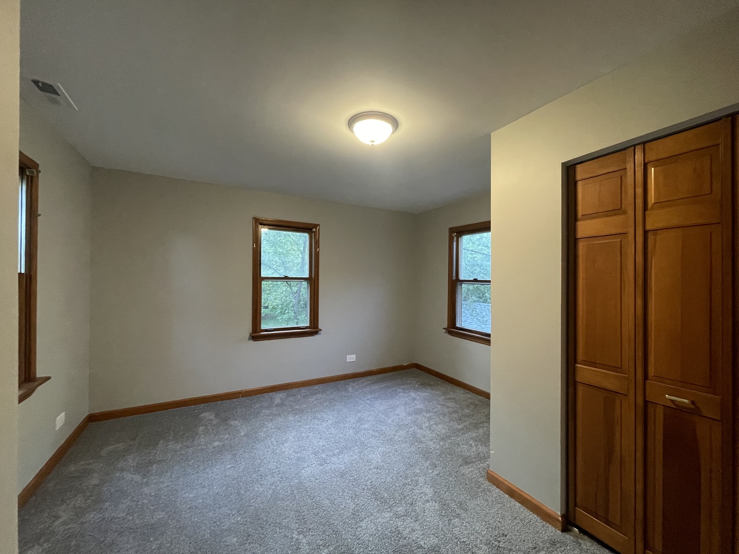 3-s284 Pattermann Road Warrenville, IL 60555 - Photo 17 of 22 an empty room with windows