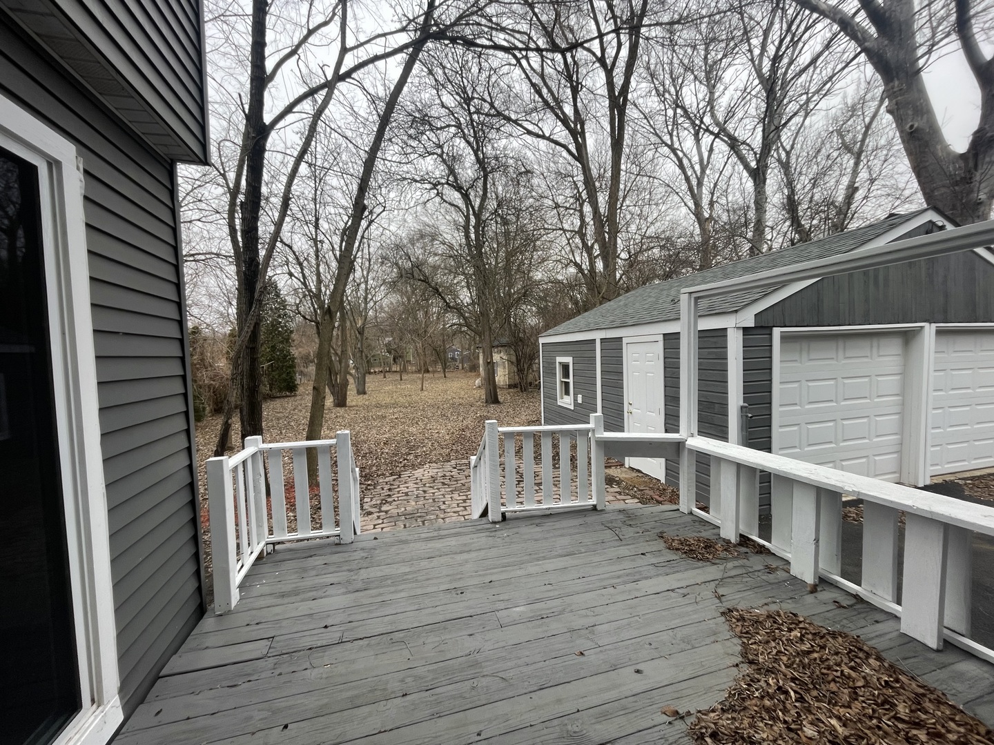 3-s284 Pattermann Road Warrenville, IL 60555 - Photo 21 of 22 a view of house with backyard and deck